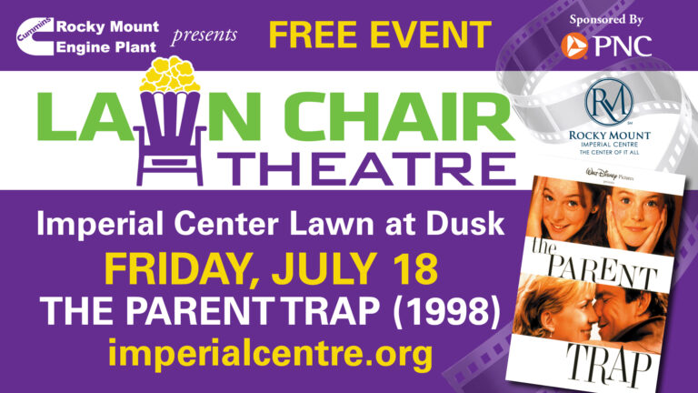 “Families enjoying a free outdoor event with live music and games in downtown Rocky Mount NC”