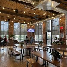 Sip and stay awhile—Rocky Mount’s breweries serve up award-winning beer, local flavor, and laid-back vibes at the historic Rocky Mount Mills.